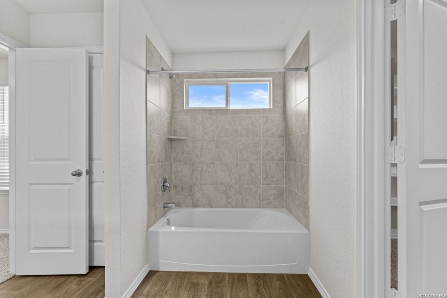 Furnished interior view inside a new home in Redbird Ranch, San Antonio (Image 9).
