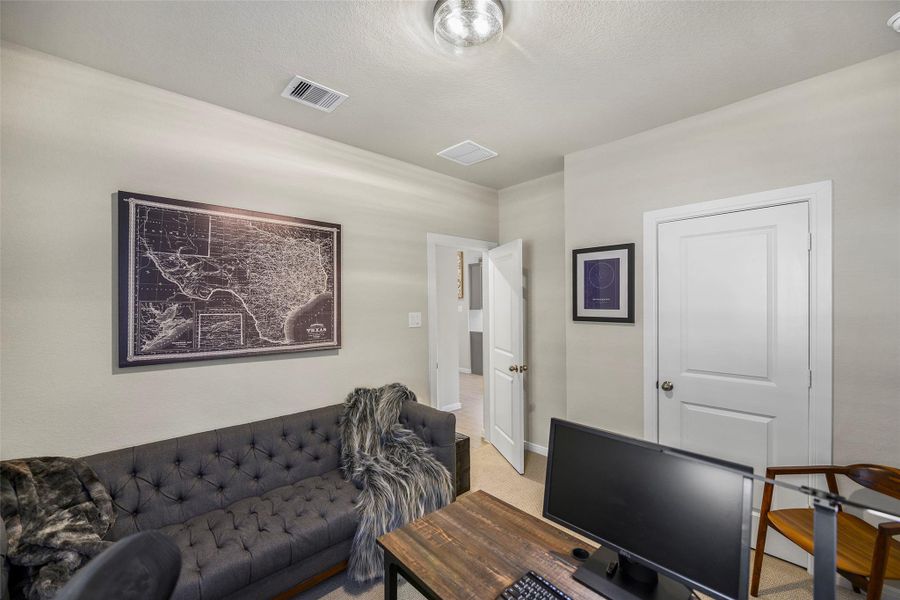 Furnished interior view inside a new home in The Highlands - Grove Collection, Porter (Image 10).