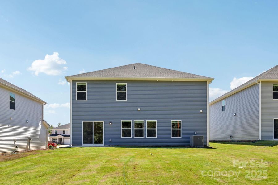 Front exterior of a new home in Nelson's Creek, Mocksville, NC, highlighting curb appeal (Image 14). Front exterior of a new home in Nelson's Creek, Mocksville, NC, highlighting curb appeal (Image 14).