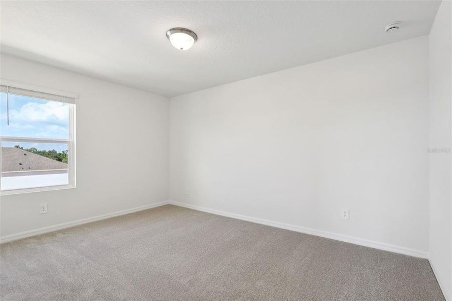 Spacious, unfurnished interior of a new home in Crosswinds - Signature Series, Haines City (Image 27).