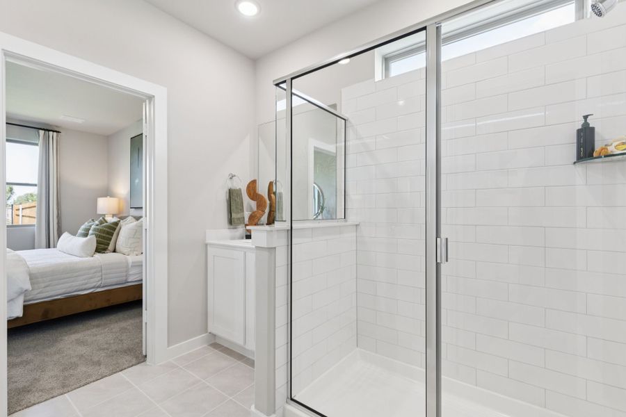 Primary Bathroom in the Magnolia home plan by Trophy Signature Homes – REPRESENTATIVE PHOTO