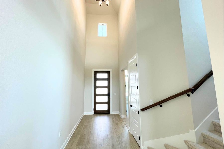 Spacious, unfurnished interior of a new home in Whisper Valley, Manor (Image 20).