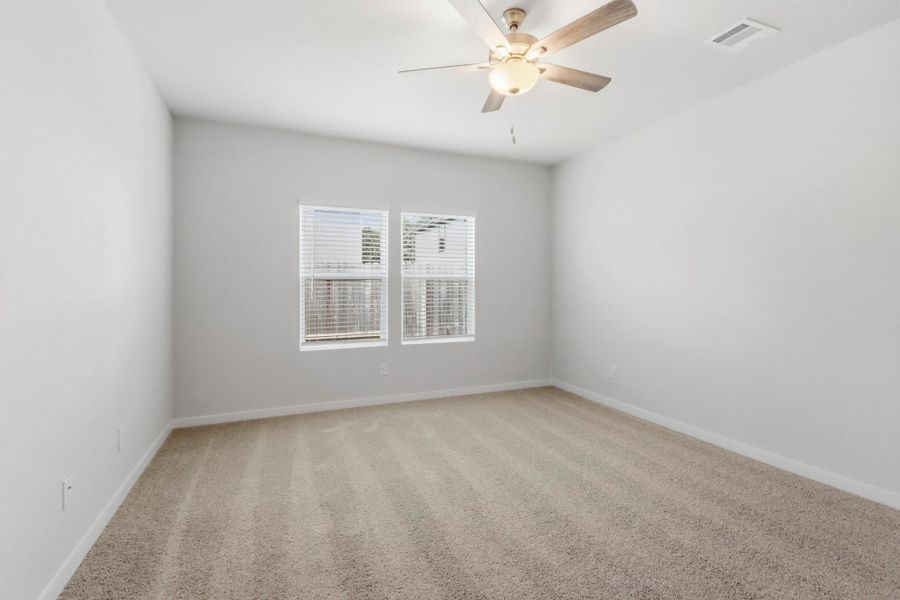 Spacious, unfurnished interior of a new home in Crockett Meadows, Conroe (Image 11). Spacious, unfurnished interior of a new home in Crockett Meadows, Conroe (Image 11).