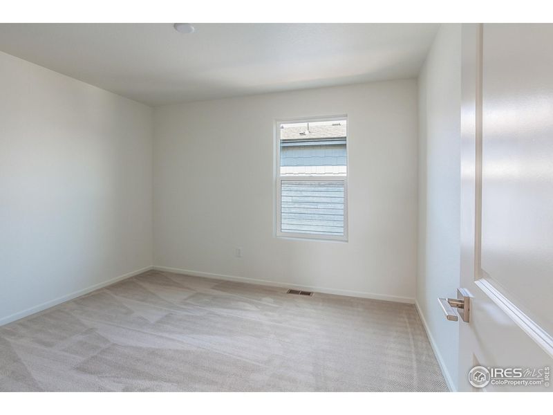 Spacious, unfurnished interior of a new home in Trailside Story Collection - Single Family Homes, Timnath (Image 30).