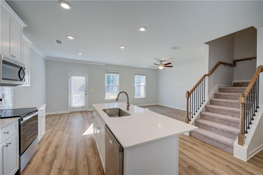 Furnished interior view inside a new home in Auburn Ridge, Riverdale (Image 8). Furnished interior view inside a new home in Auburn Ridge, Riverdale (Image 8).