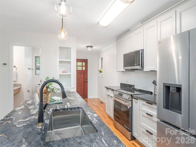 Furnished interior view inside a new home in , Waynesville (Image 6).