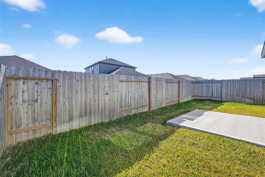 Exterior details and patio area of a home in , Magnolia (Image 25). Exterior details and patio area of a home in , Magnolia (Image 25).