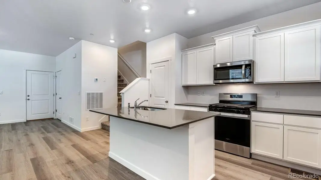 Furnished interior view inside a new home in Arcadia, Denver (Image 9).