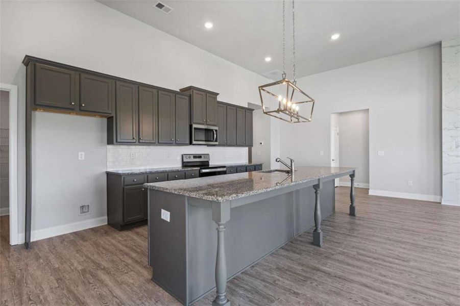 Furnished interior view inside a new home in Waters Edge, Mansfield (Image 3).