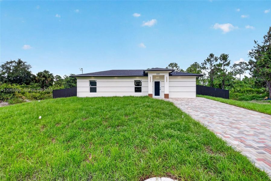 Exterior details and patio area of a home in , Lehigh Acres (Image 3).