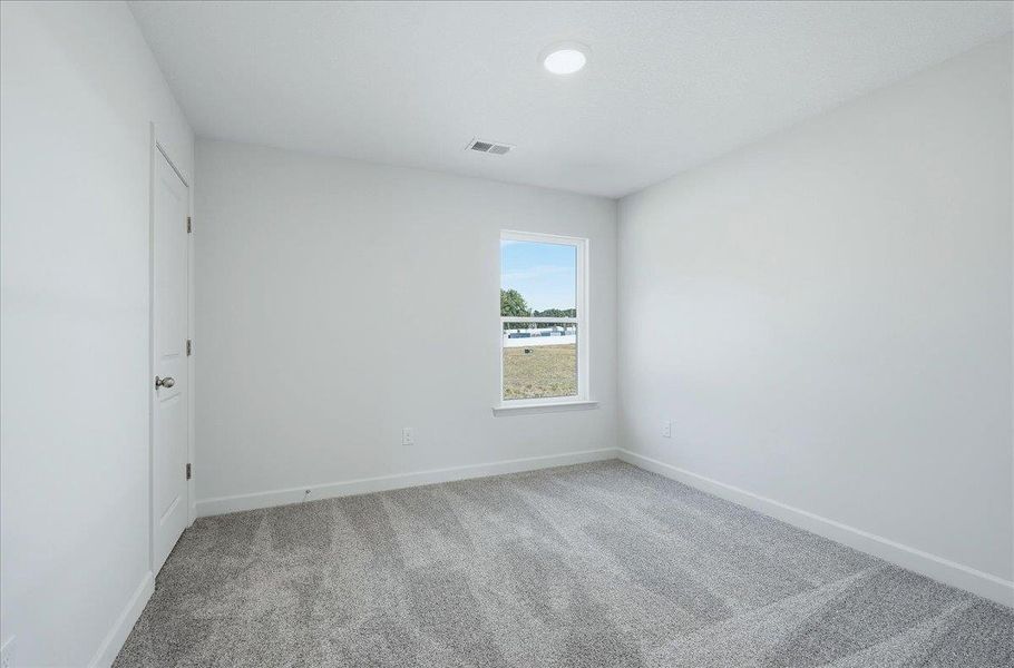 Spacious, unfurnished interior of a new home in Stones Throw, Inman (Image 23).