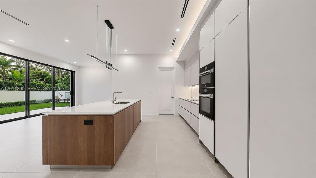 Furnished interior view inside a new home in , Miami Lakes (Image 7).