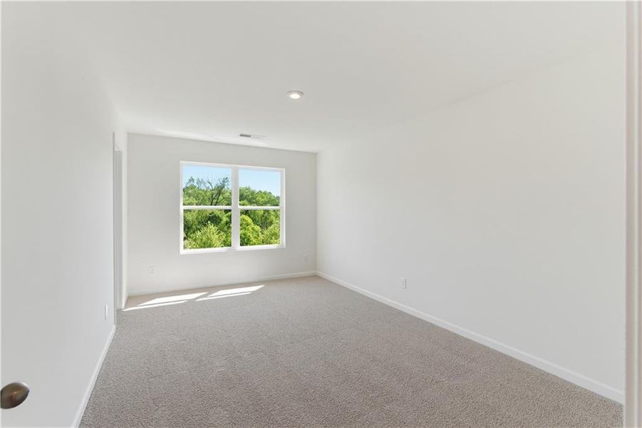 Spacious, unfurnished interior of a new home in The View at Groover’s Lake, Lithia Springs (Image 15).
