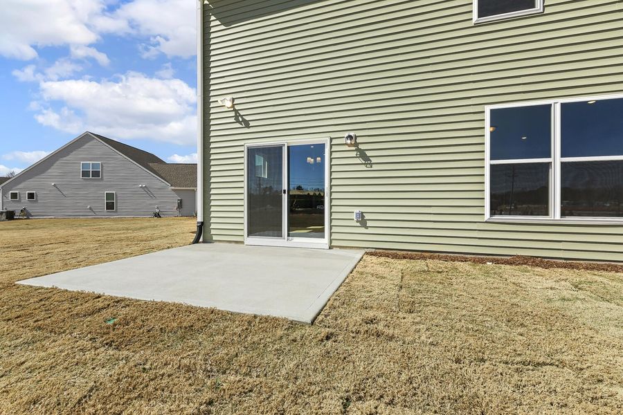 Front exterior of a new home in 1158 Place, Wilson, NC, highlighting curb appeal (Image 25).