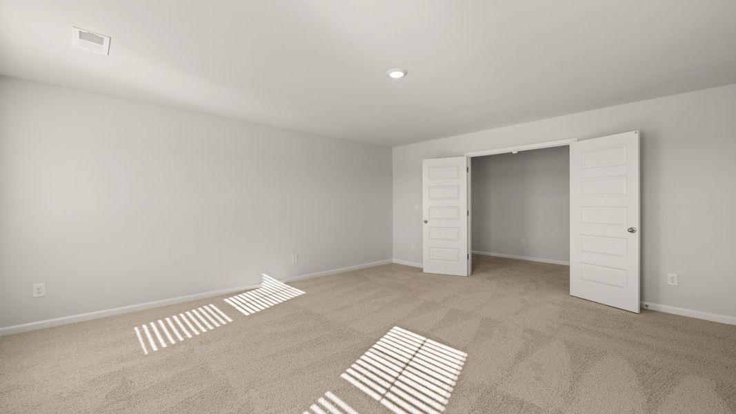 Representative unfurnished interior of a home built from the Mansfield by D.R. Horton in Southwind Village, Evans (Image 25).