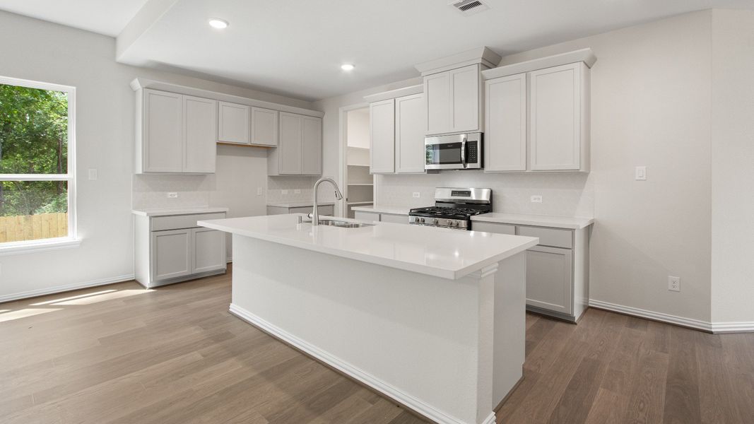 Representative furnished interior of a home built from the Cayman by Brightland Homes in Bridgeland Creekland Village, Cypress (Image 7).