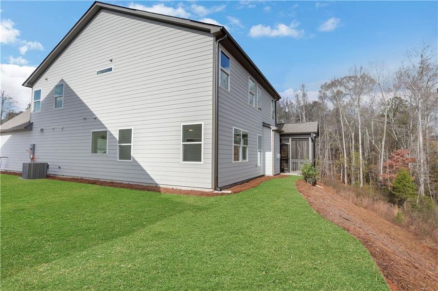 Exterior details and patio area of a home in Marble Tree, Ball Ground (Image 4).
