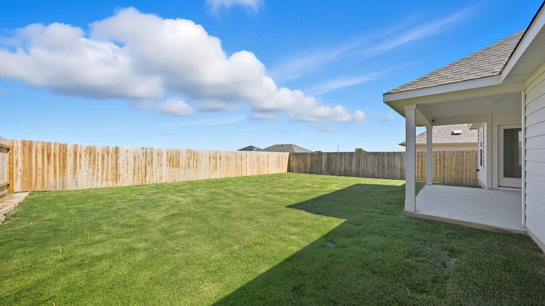Exterior details and patio area of a home in Hunters Glen, Jarrell (Image 3).