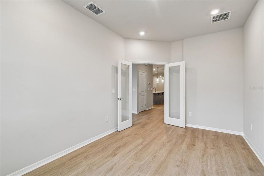 Spacious, unfurnished interior of a new home in Laureate Park at Lake Nona - Garden Series, Orlando (Image 17).