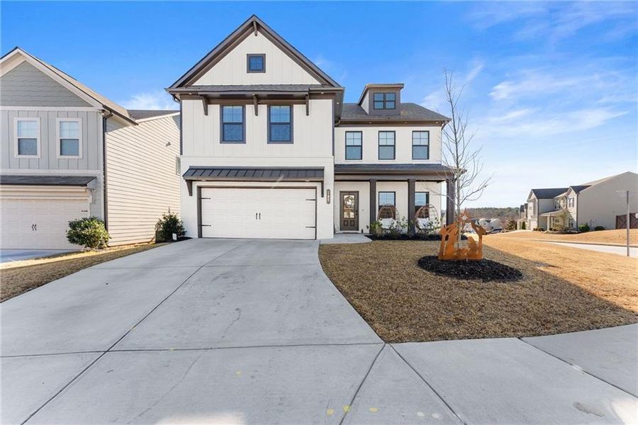 Front exterior of a new home in , Auburn, GA, highlighting curb appeal (Image 20).