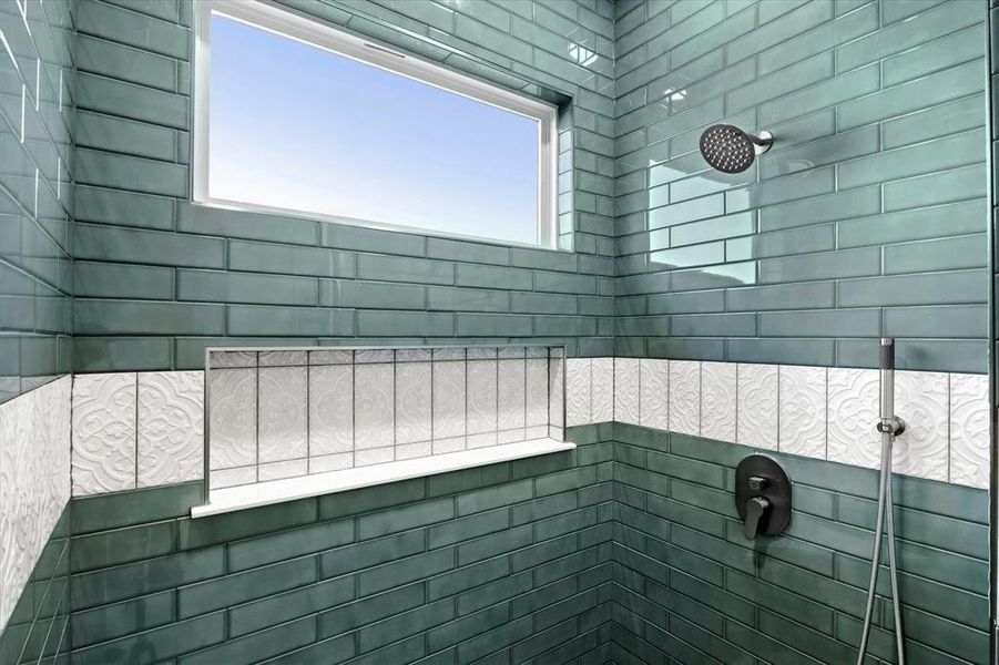 Full bath with tiled shower Full bath with tiled shower