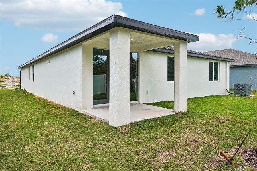 Exterior details and patio area of a home in Pine Ridge Meadows, Hudson (Image 28).