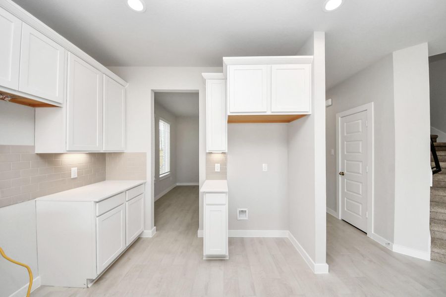 This generously spacious kitchen is a dream realized!