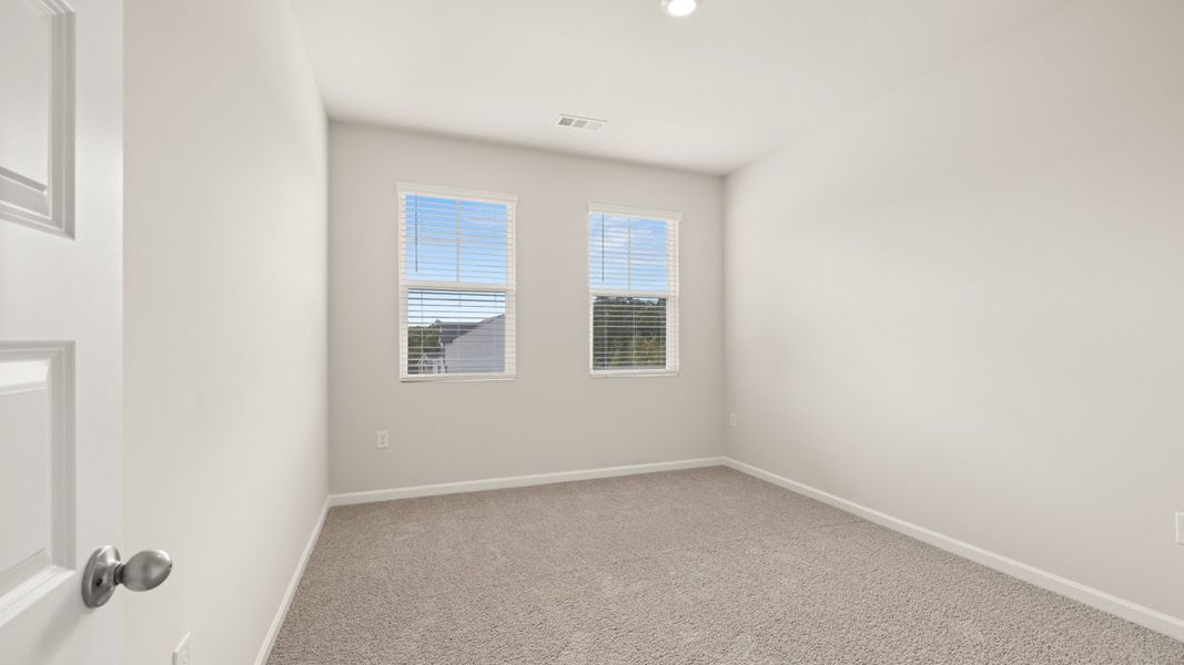 Representative unfurnished interior of a home built from the Avion by D.R. Horton in Brooks Station, Dacula (Image 19).