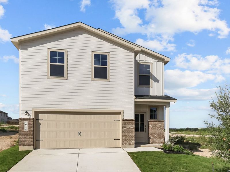 Front exterior of a new home in Agave, San Antonio, TX, highlighting curb appeal (Image 2). Front exterior of a new home in Agave, San Antonio, TX, highlighting curb appeal (Image 2).