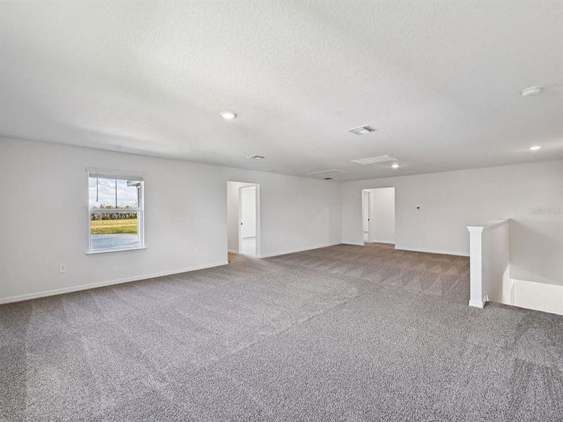 Spacious, unfurnished interior of a new home in Oakfield Trails - Premier Series, Parrish (Image 28).