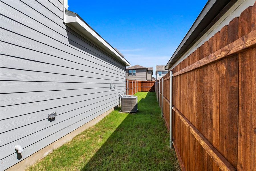 Exterior details and patio area of a home in Orchard Village, Fort Worth (Image 3). Exterior details and patio area of a home in Orchard Village, Fort Worth (Image 3).