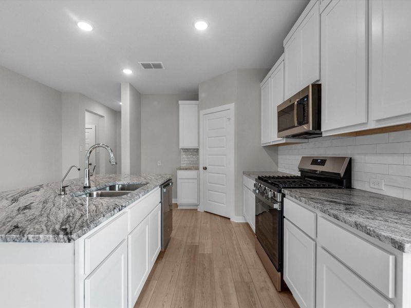Furnished interior view inside a new home in Mason Woods, Cypress (Image 5).