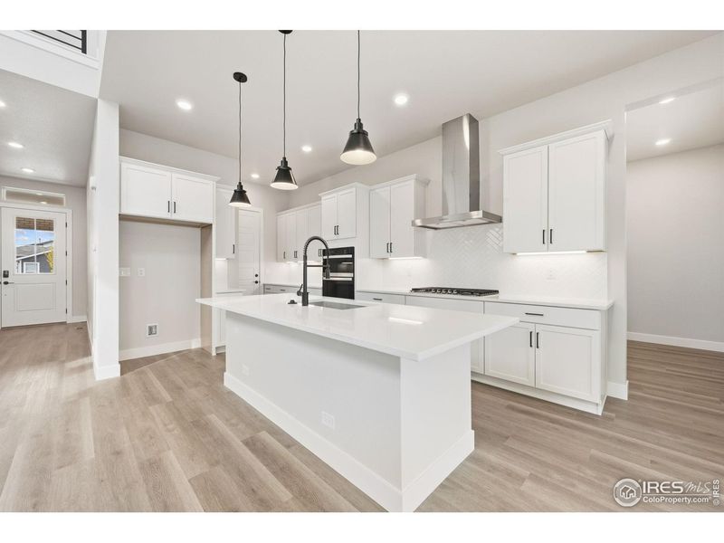 Furnished interior view inside a new home in Festival at RainDance, Windsor (Image 3).