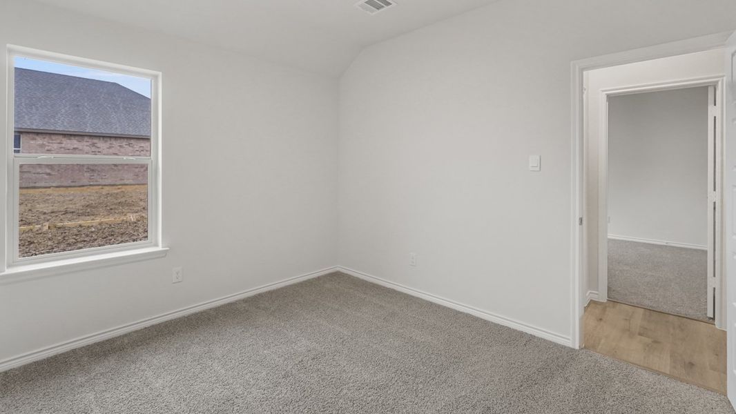 Spacious, unfurnished interior of a new home in Fireside by the Lake, Garland (Image 24).