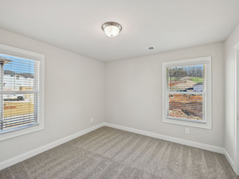 Spacious, unfurnished interior of a new home in Martin Springs - Cottage Series, Lawrenceville (Image 19).