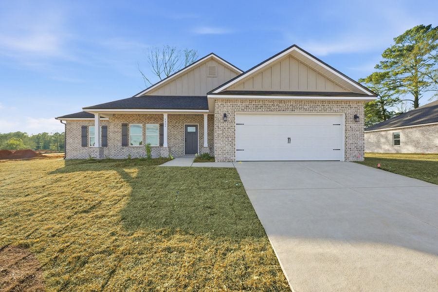 Front exterior of a new home in Barton's Bend, Crestview, FL, highlighting curb appeal (Image 1). Front exterior of a new home in Barton's Bend, Crestview, FL, highlighting curb appeal (Image 1).