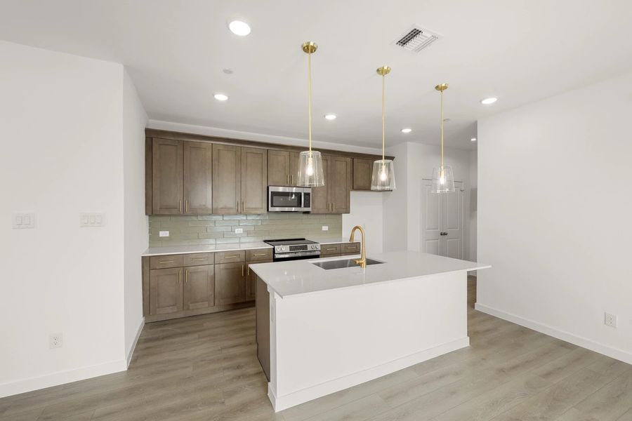 Kitchen featuring the Laguna Collection Kitchen featuring the Laguna Collection