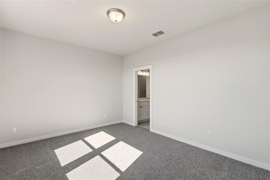 Empty room featuring carpet