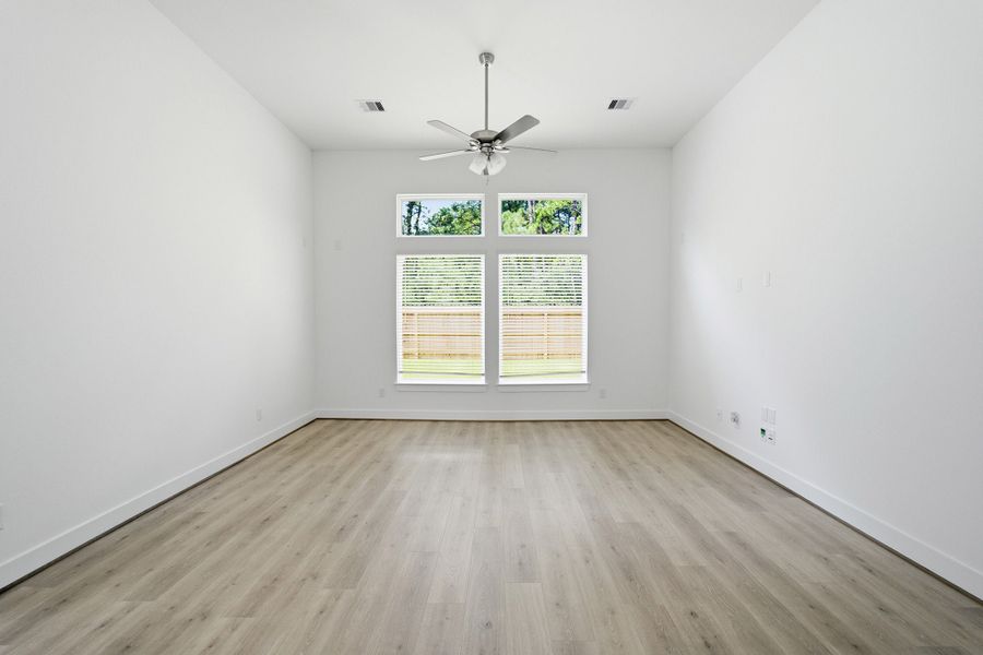 Spacious, unfurnished interior of a new home in Sundance Cove, Crosby (Image 32).