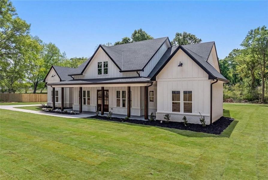 Front exterior of a new home in , Monroe, GA, highlighting curb appeal (Image 32).