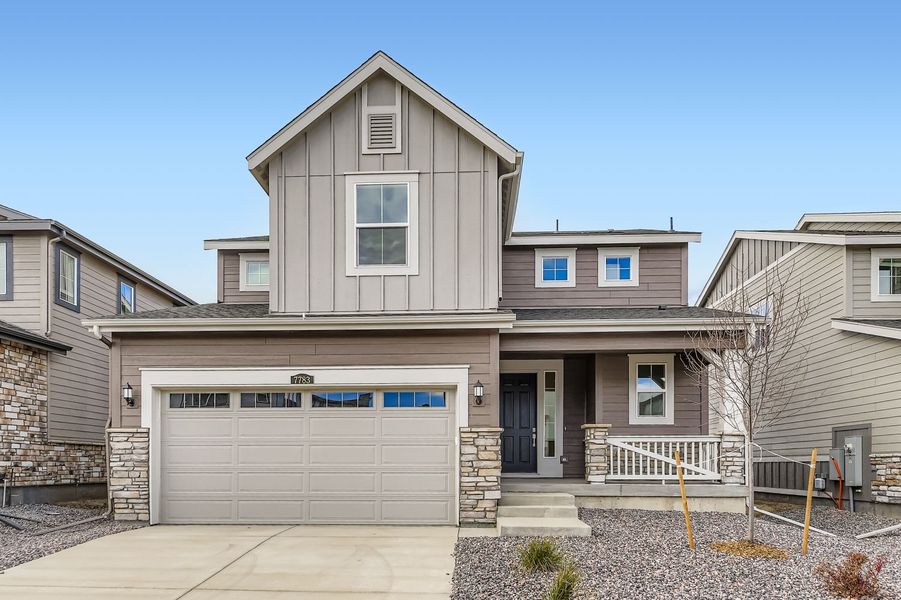 Exterior details and patio area of a home in Vermilion Creek: The Pioneer Collection, Centennial (Image 1).