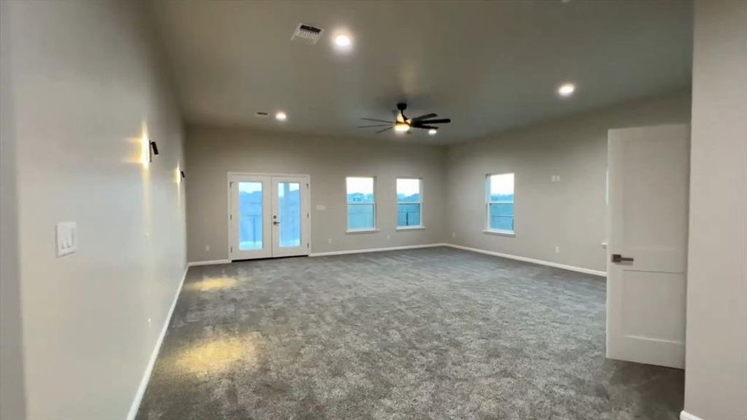 Carpeted empty room with french doors, recessed lighting, and ceiling fan