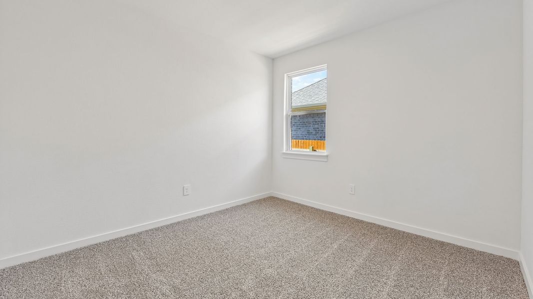 Spacious, unfurnished interior of a new home in Rosenbusch Ranch, Leander (Image 37).