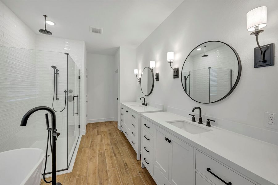 Luxurious primary bath (*Photo not of actual home and used for illustration purposes only.)