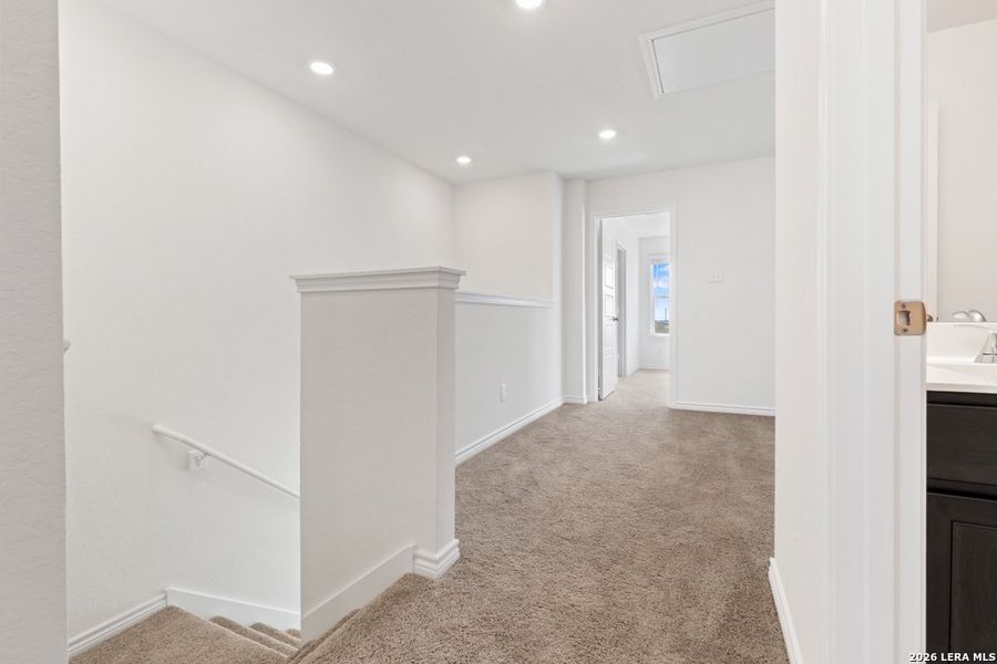 Spacious, unfurnished interior of a new home in Preserve at Culebra - Villa Collection, San Antonio (Image 17). Spacious, unfurnished interior of a new home in Preserve at Culebra - Villa Collection, San Antonio (Image 17).