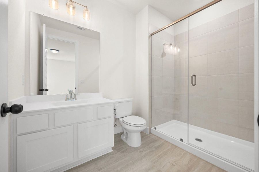 Furnished interior view inside a new home in Bridgeland, Cypress (Image 9).