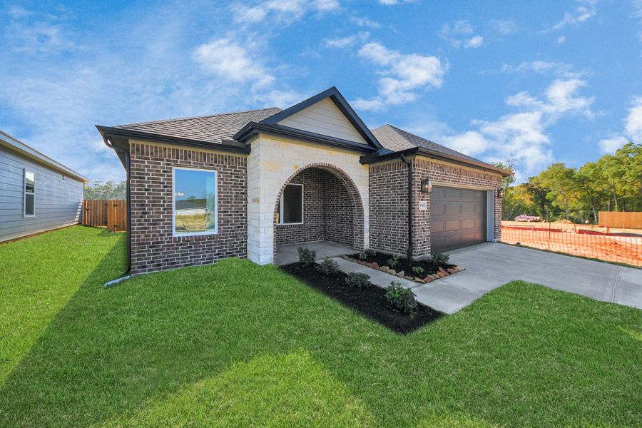 Front exterior of a new home in Lexington Heights, Willis, TX, highlighting curb appeal (Image 25). Front exterior of a new home in Lexington Heights, Willis, TX, highlighting curb appeal (Image 25).