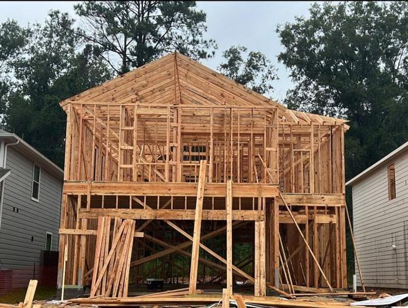 Front exterior of a new home in Maple Heights, Porter, TX, highlighting curb appeal (Image 1). Front exterior of a new home in Maple Heights, Porter, TX, highlighting curb appeal (Image 1).