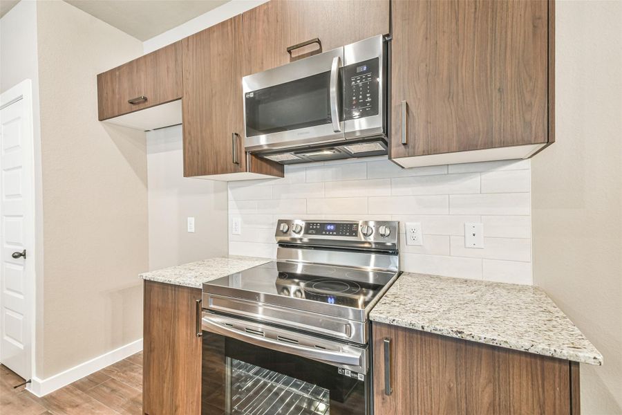 Furnished interior view inside a new home in Enclave At Dobbin, Magnolia (Image 7).