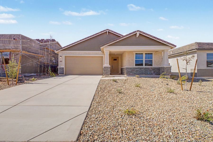 Front exterior of a new home in White Tank Vistas, Waddell, AZ, highlighting curb appeal (Image 1). Front exterior of a new home in White Tank Vistas, Waddell, AZ, highlighting curb appeal (Image 1).